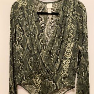 Green snakeskin print body suit